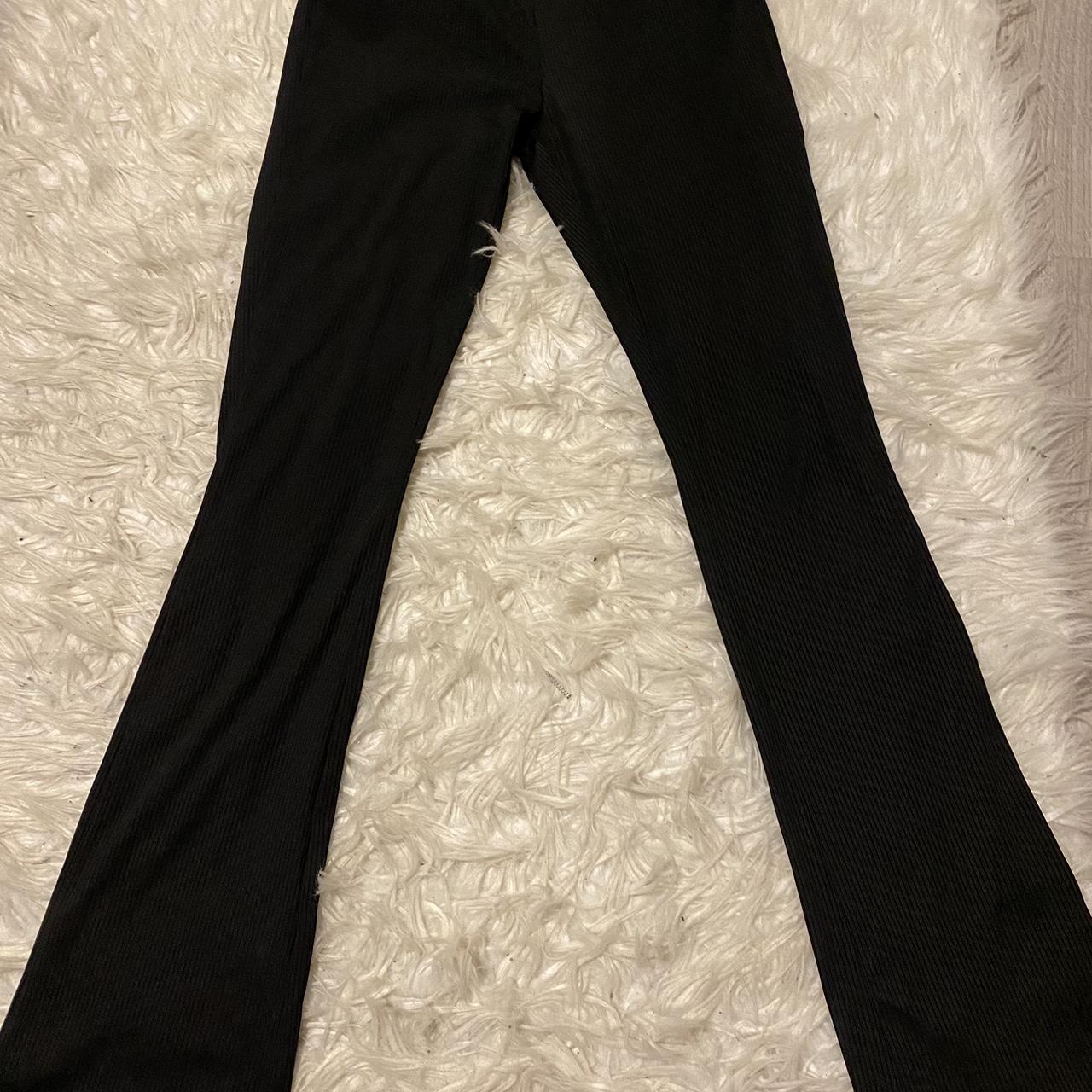 Black ribbed H&M flares only worn once Size small - Depop