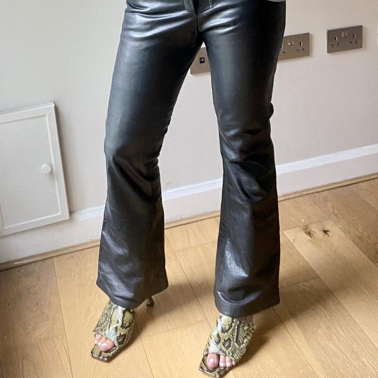 A pair of gorgeous black leather trousers made of... - Depop