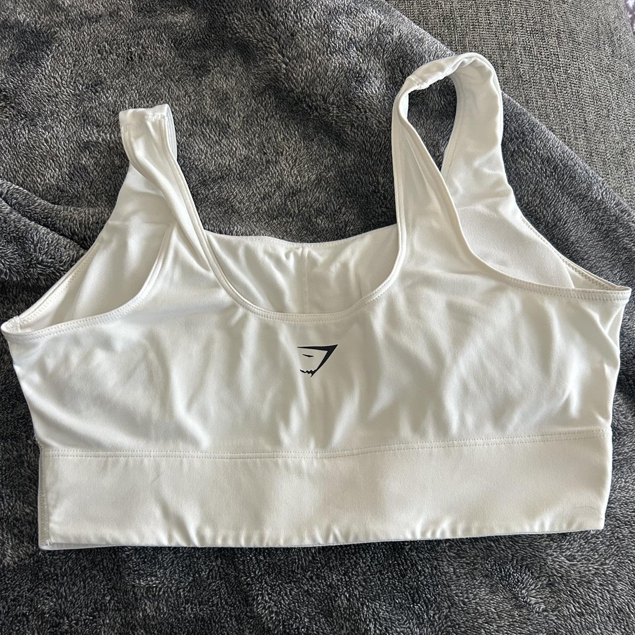 Gymshark sports bra. Very supportive. Removable... Depop