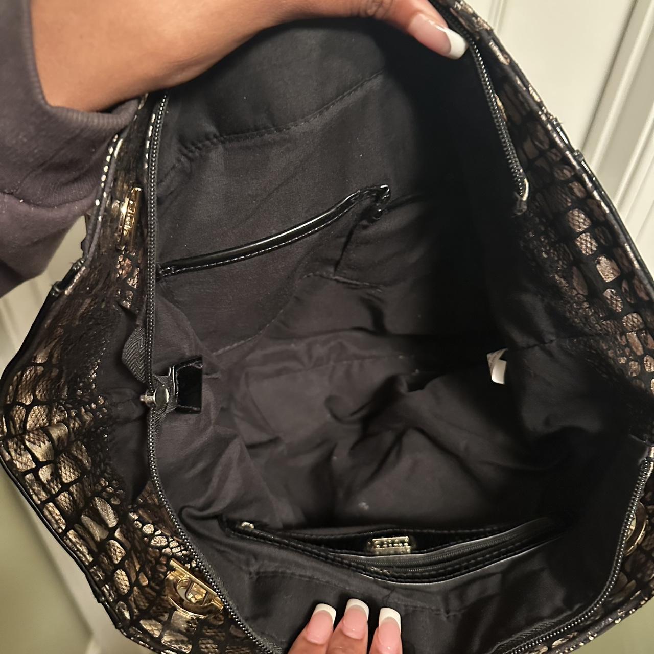 Edgy black and silver snake print shoulder bag by... Depop