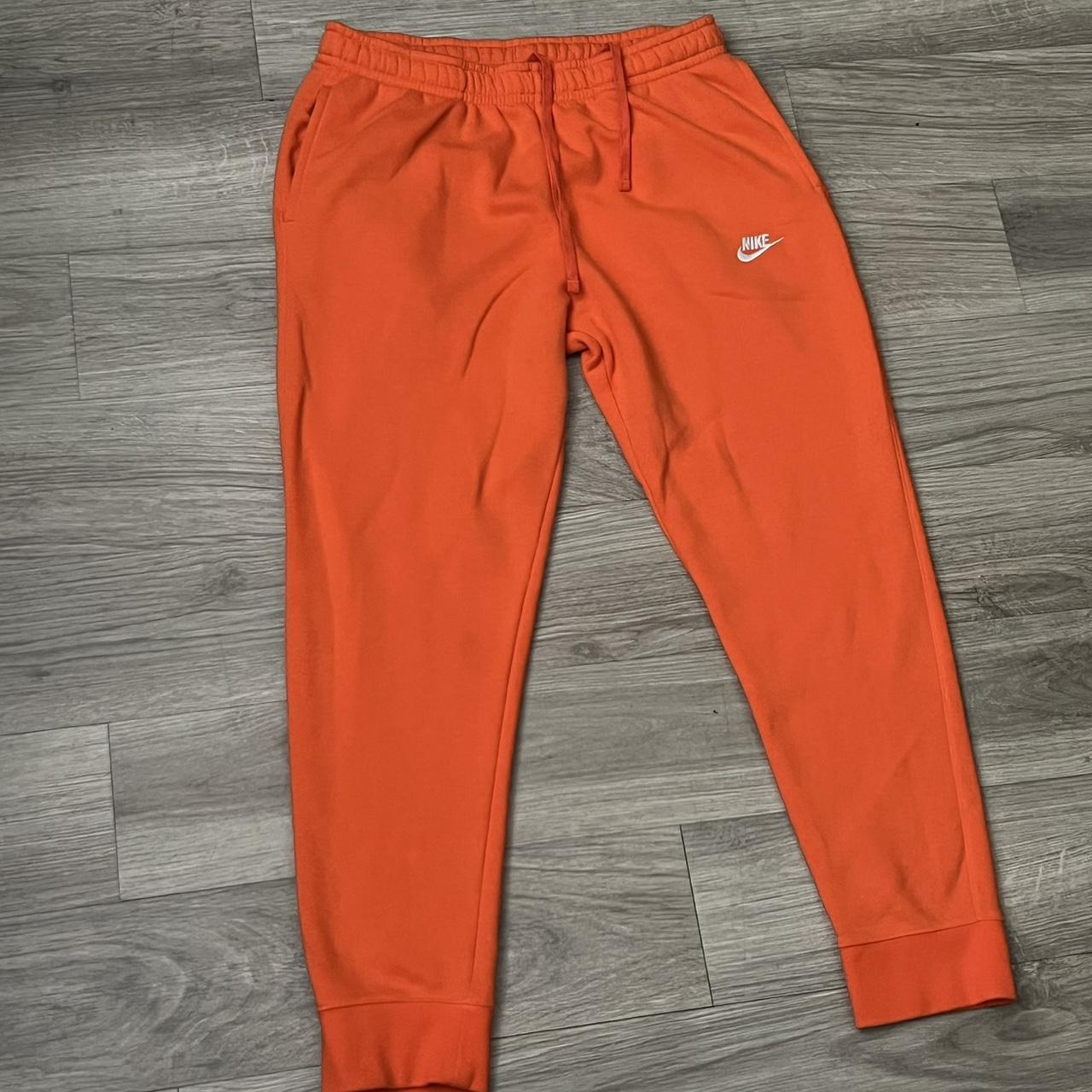 Nike orange jumpsuit best sale