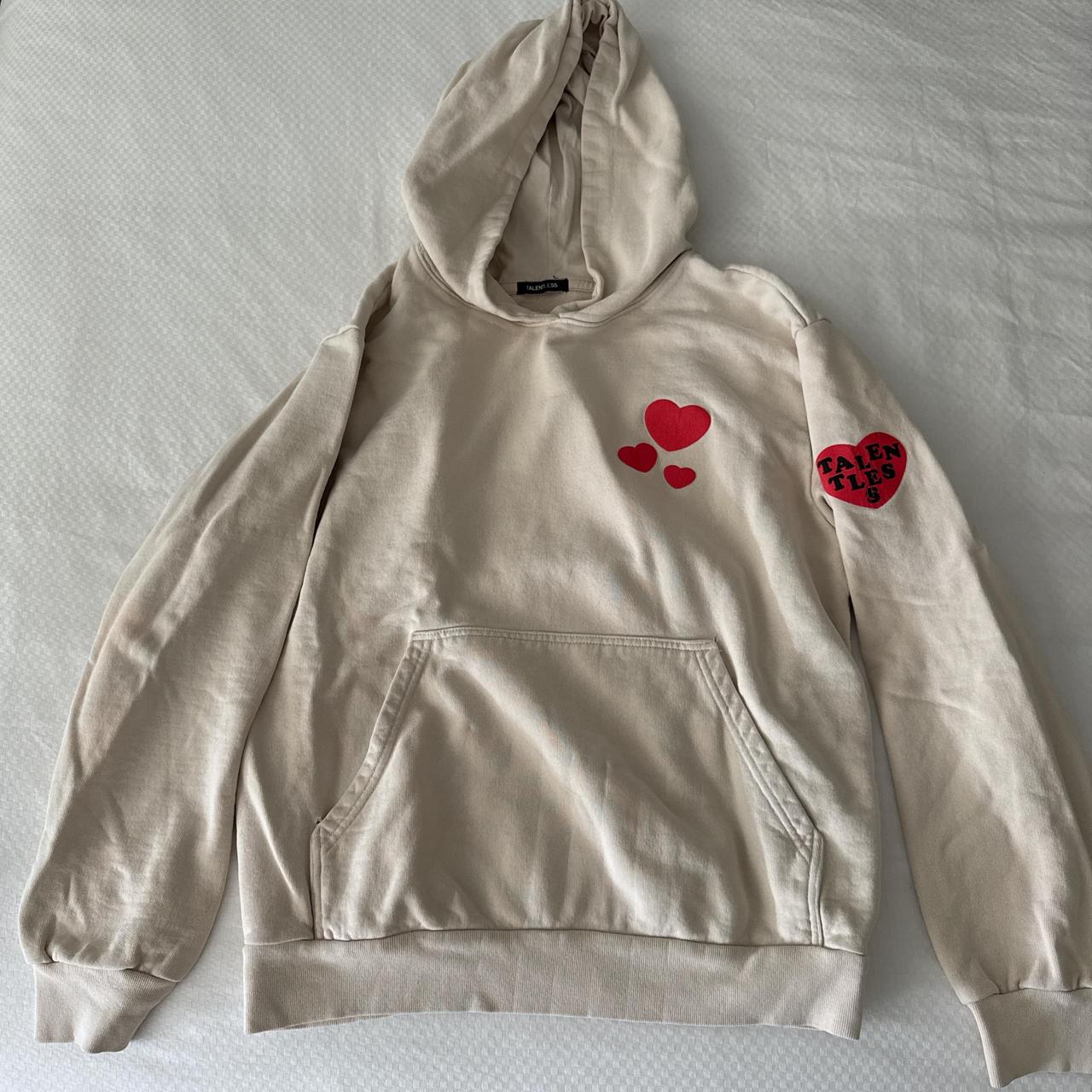 Talentless cream hoodie with red hearts size M Depop