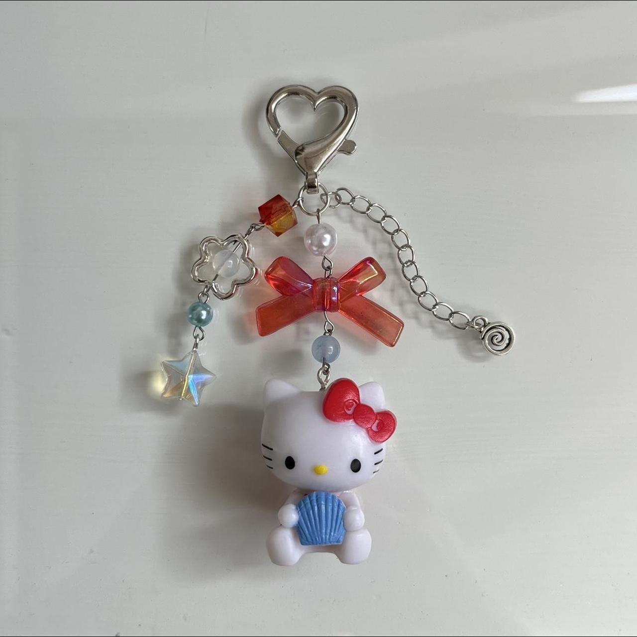 hello kitty keychain Handcrafted keychain with blue... - Depop