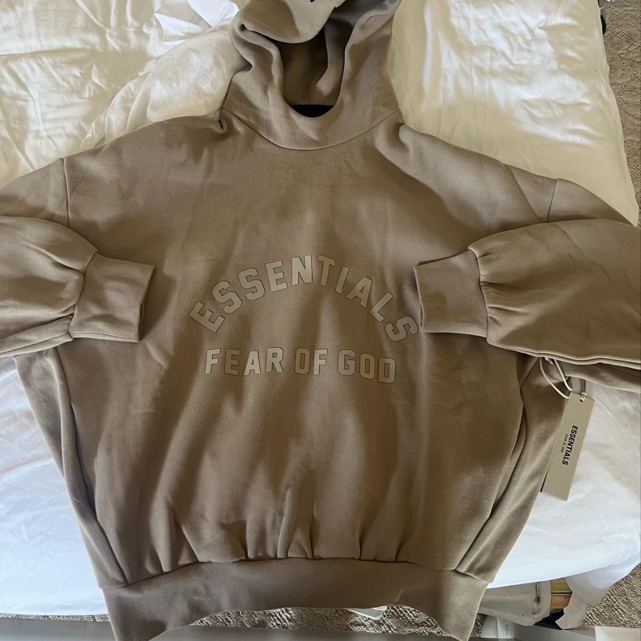 Has anyone seen this Essentials x FOG hoodie in dark brown? All I