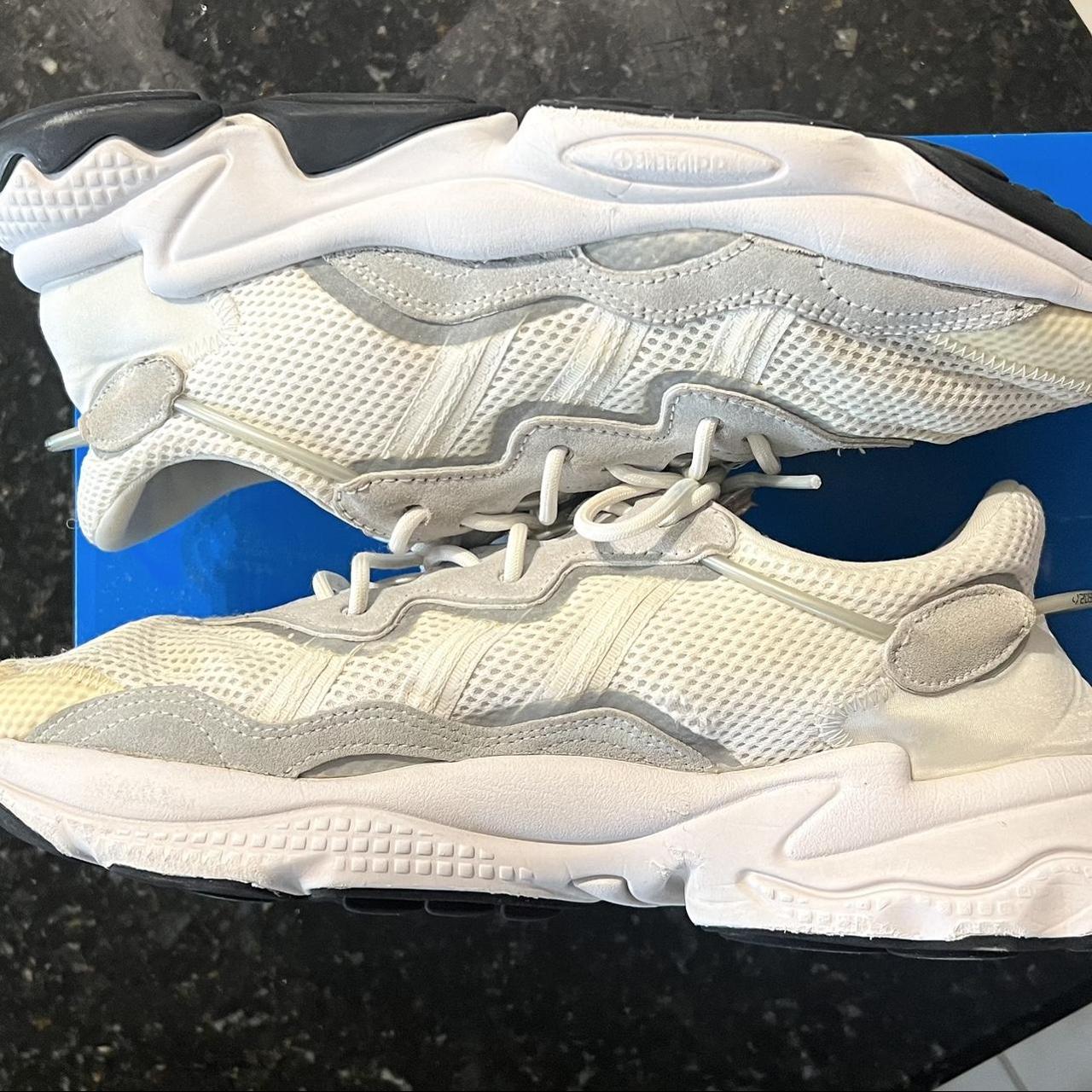 White Ozweegos Solid condition, toe has yellowed Depop