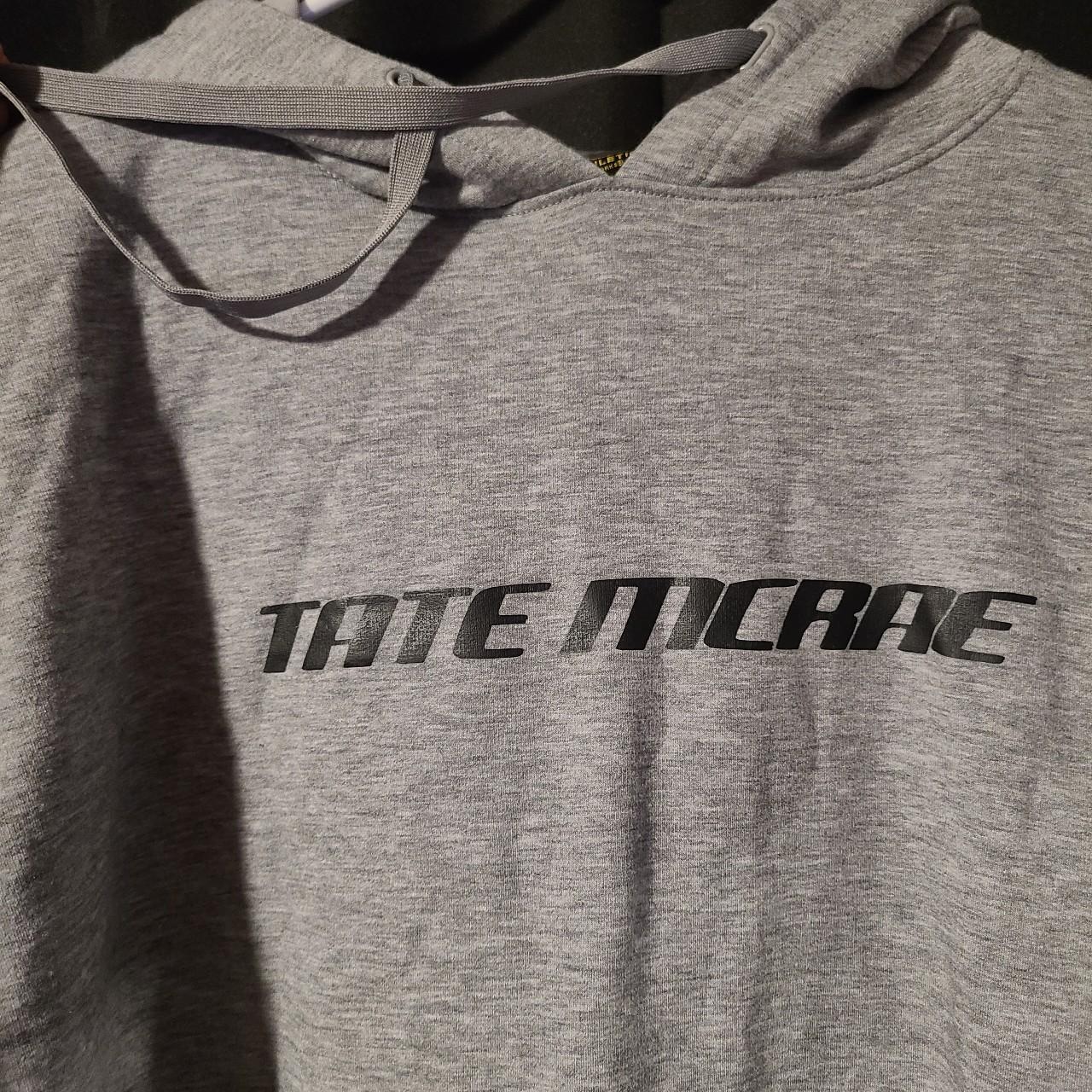 Tate McRae grey hoodie. Logo on front and sleeve.... Depop