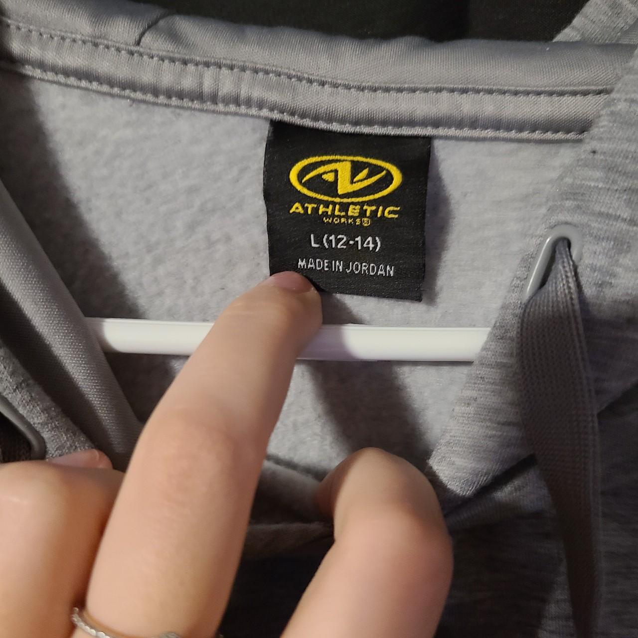 Tate McRae grey hoodie. Logo on front and sleeve.... Depop