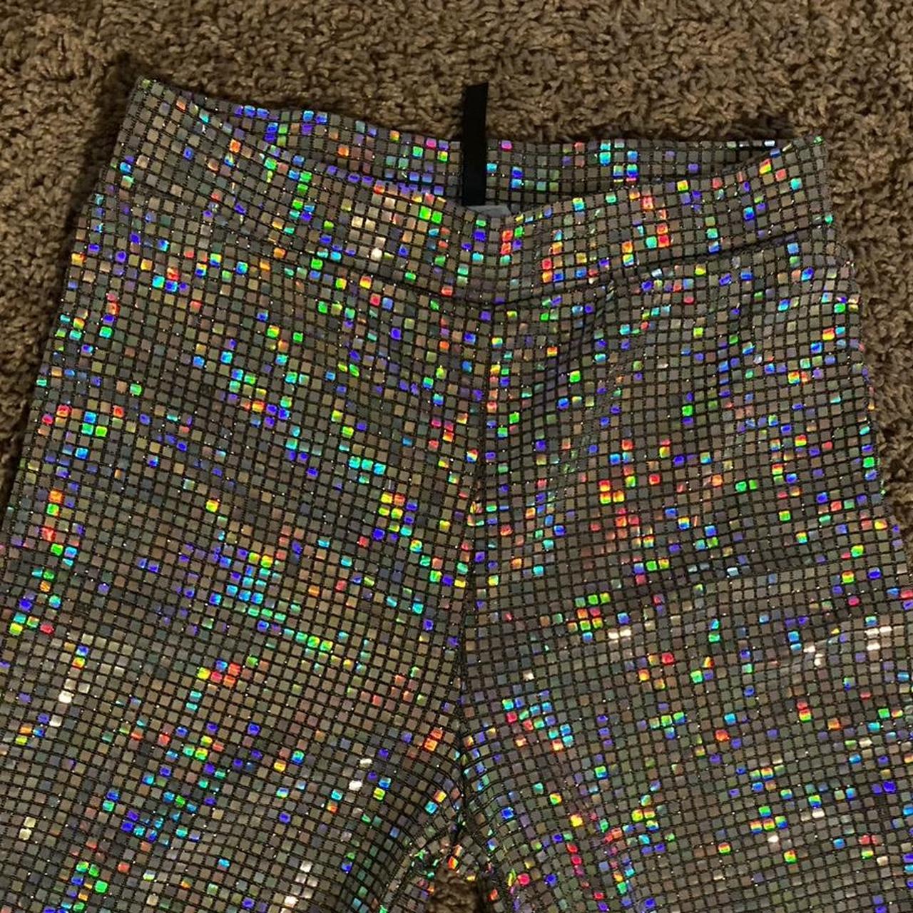 Holographic flare pants. A few missing tiny squares... - Depop