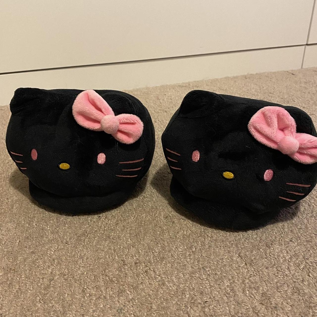 black and pink hello kitty slippers size... Depop
