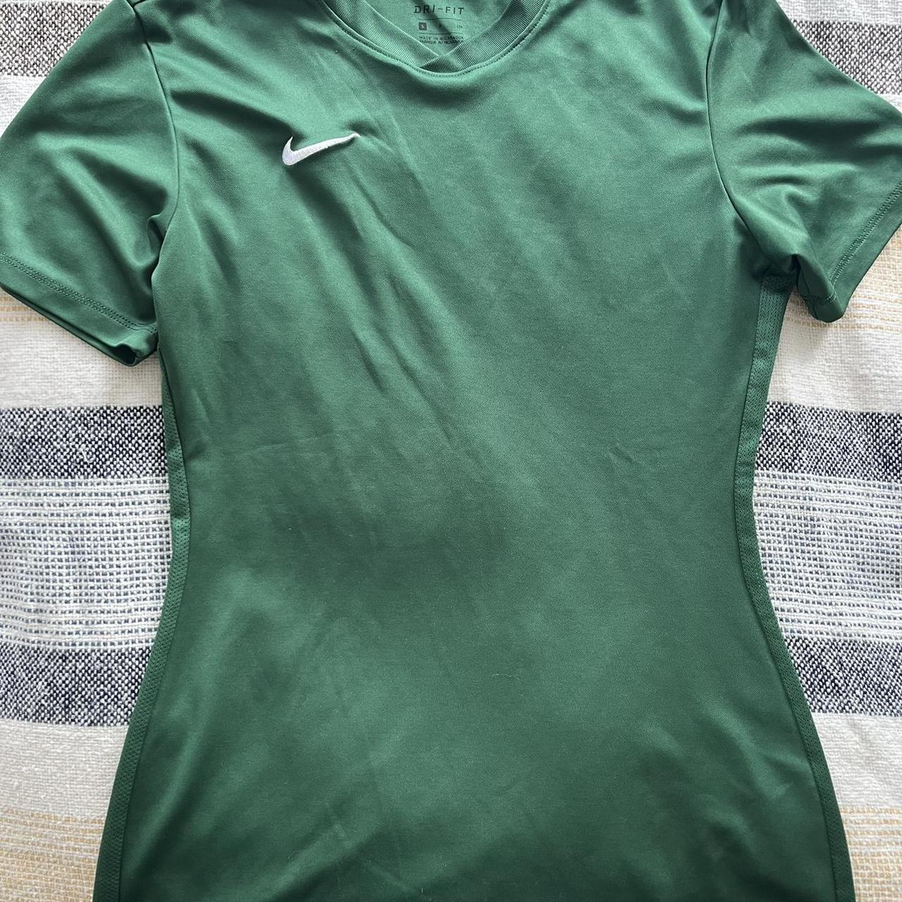 Green running Tshirt from Nike, with Vneck.... Depop