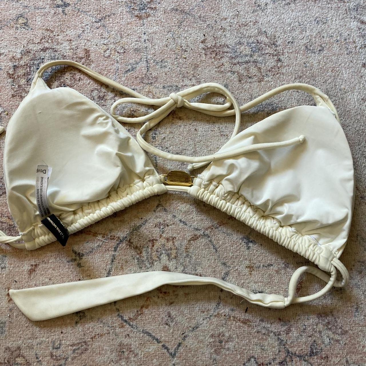 Cream bikini top featuring turquoise stone in the... Depop