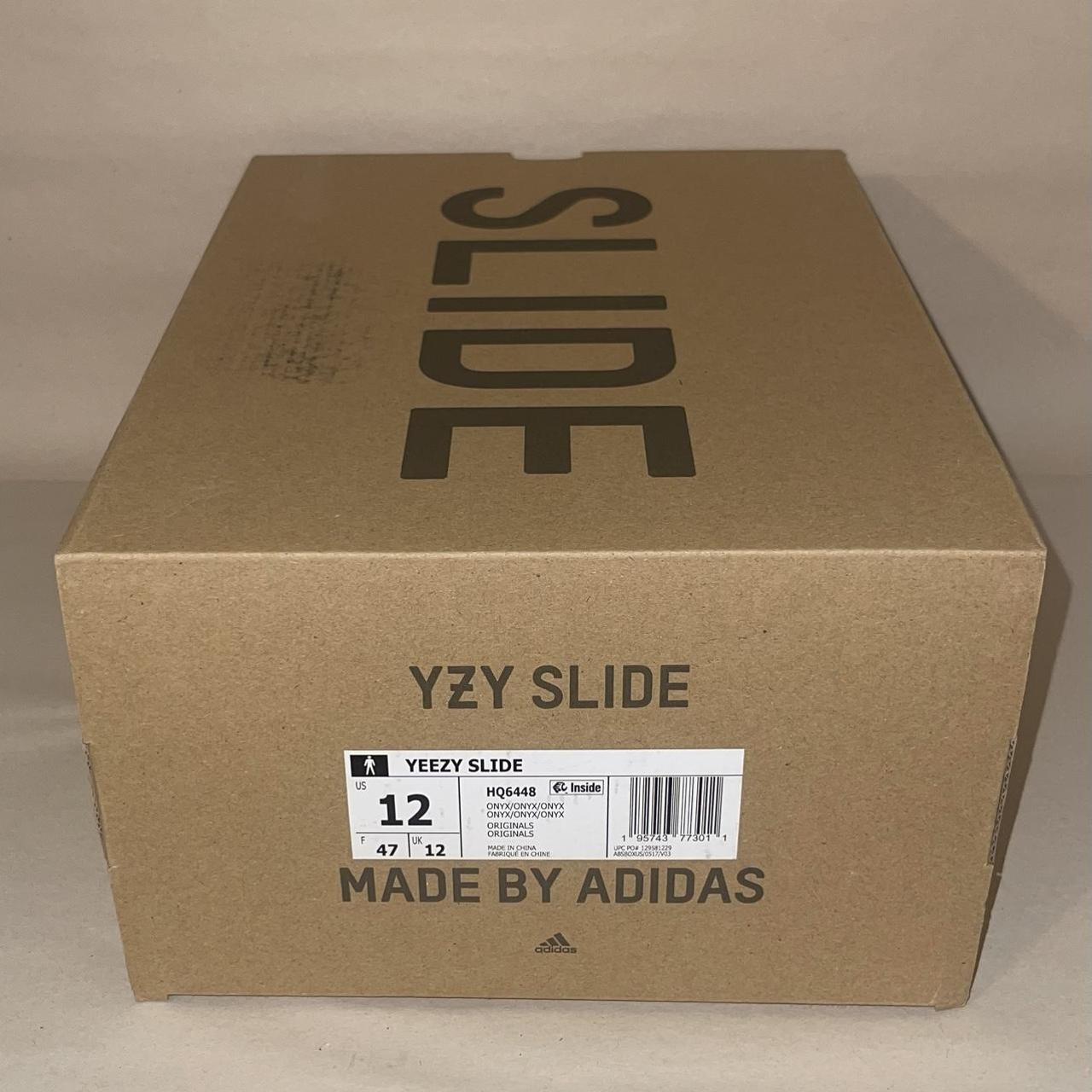 Yeezy slide onyx Mens Size 12 / womens size... - Depop