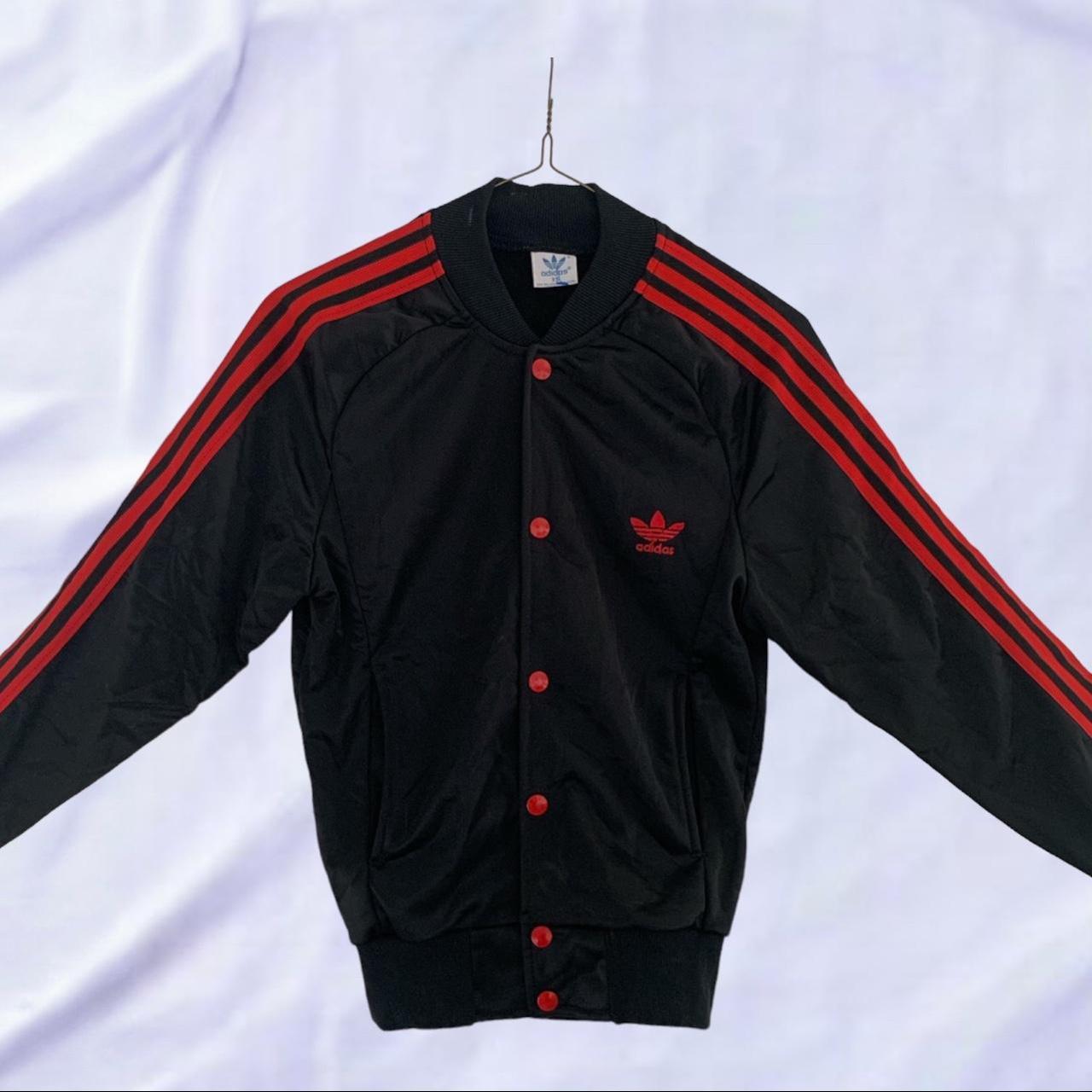 Black with red stripe hotsell adidas jacket