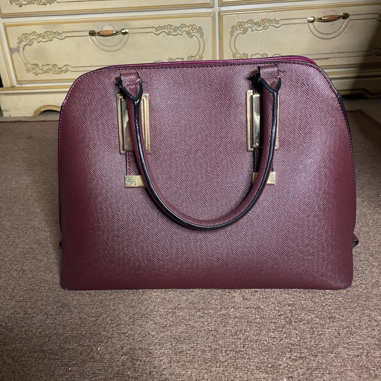 ALDO Maroon bag. She s a little dusty but I will