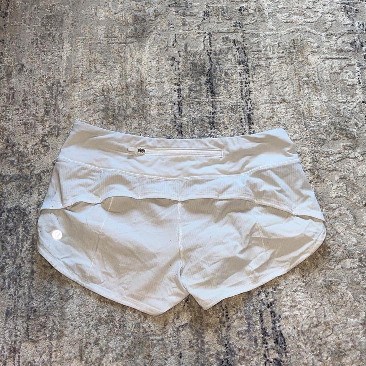 White Lululemon hotty hot 2.5 inch low rise shorts.... - Depop