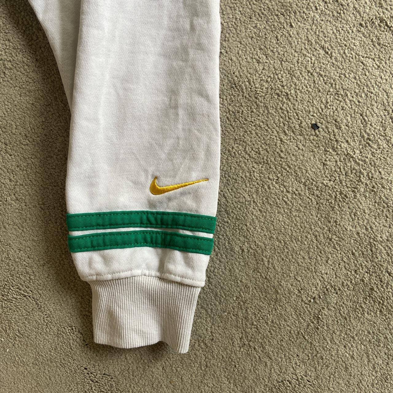 White and Green Nike Jumper Size S worn once Depop