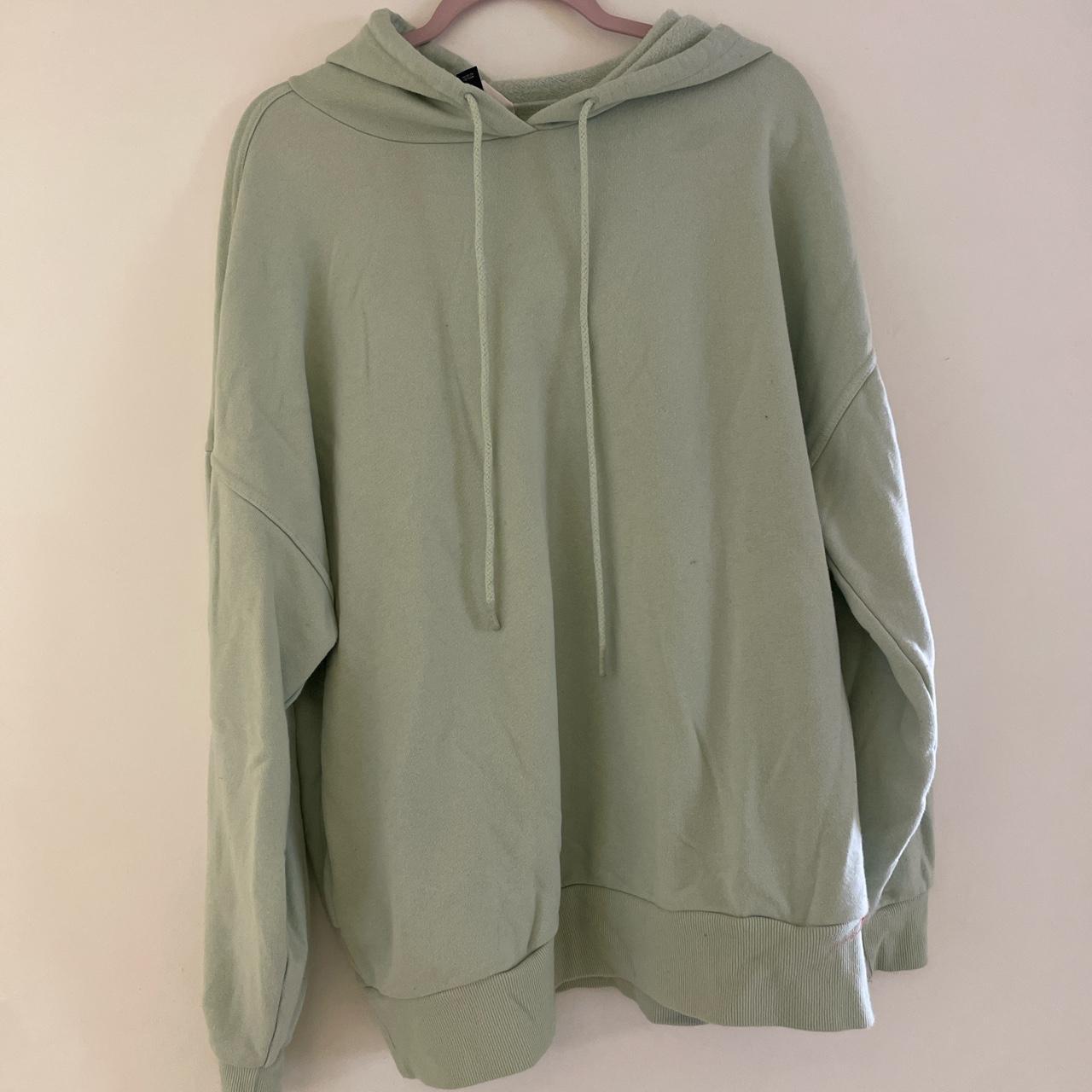 Light green oversized hoodie with side pockets - Depop