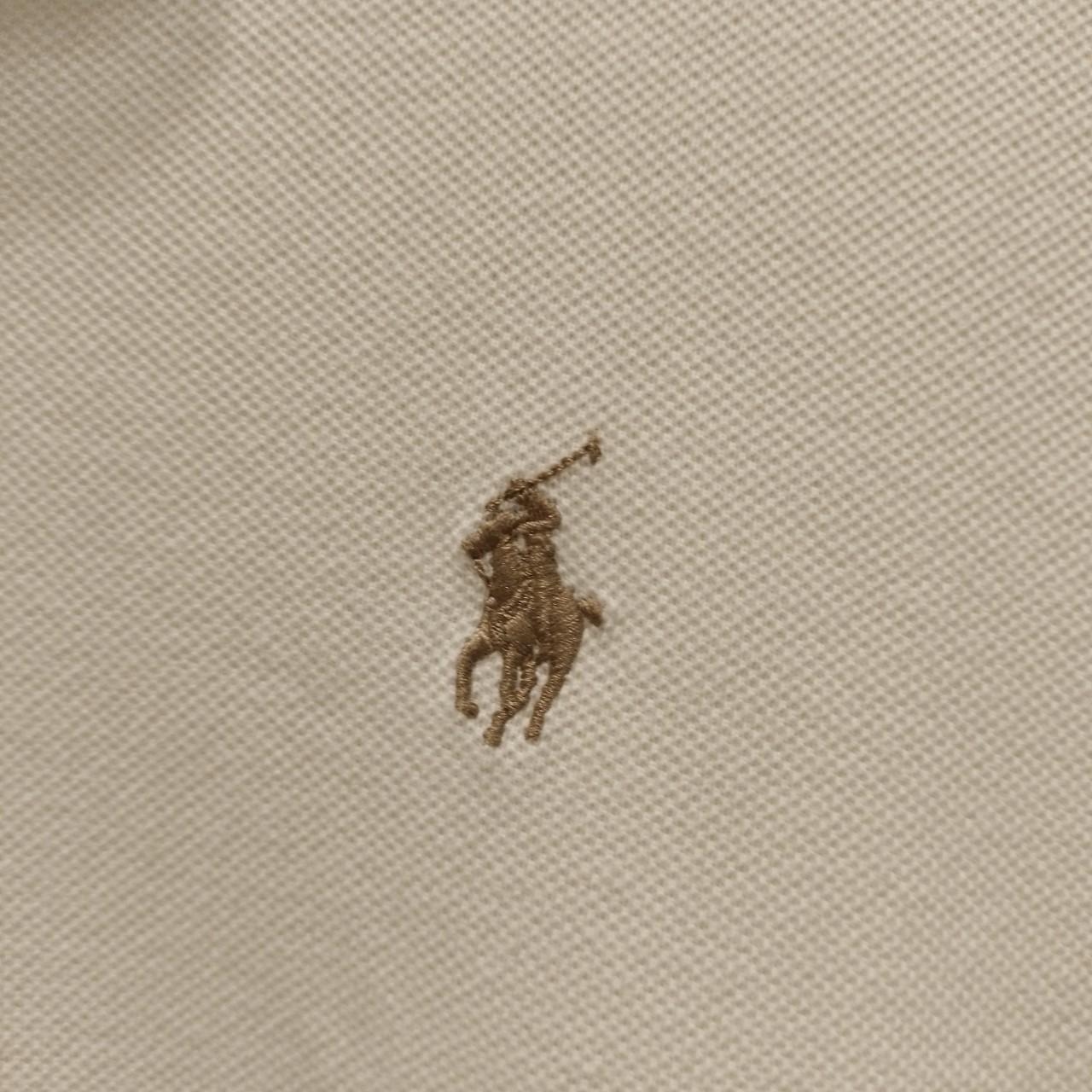 Polo Ralph Lauren bianco panna. Mostra il logo in... - Depop