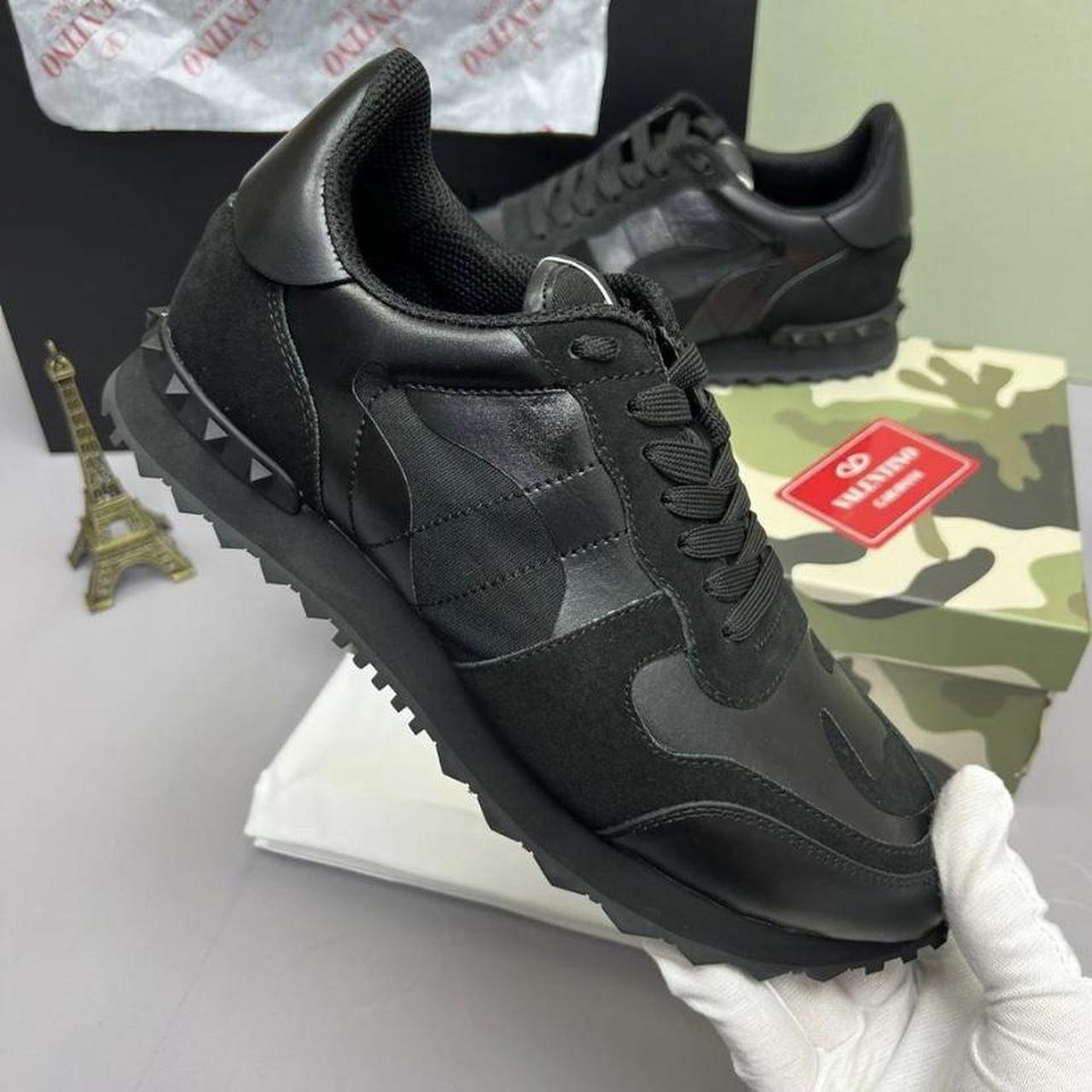 triple black valentino trainers