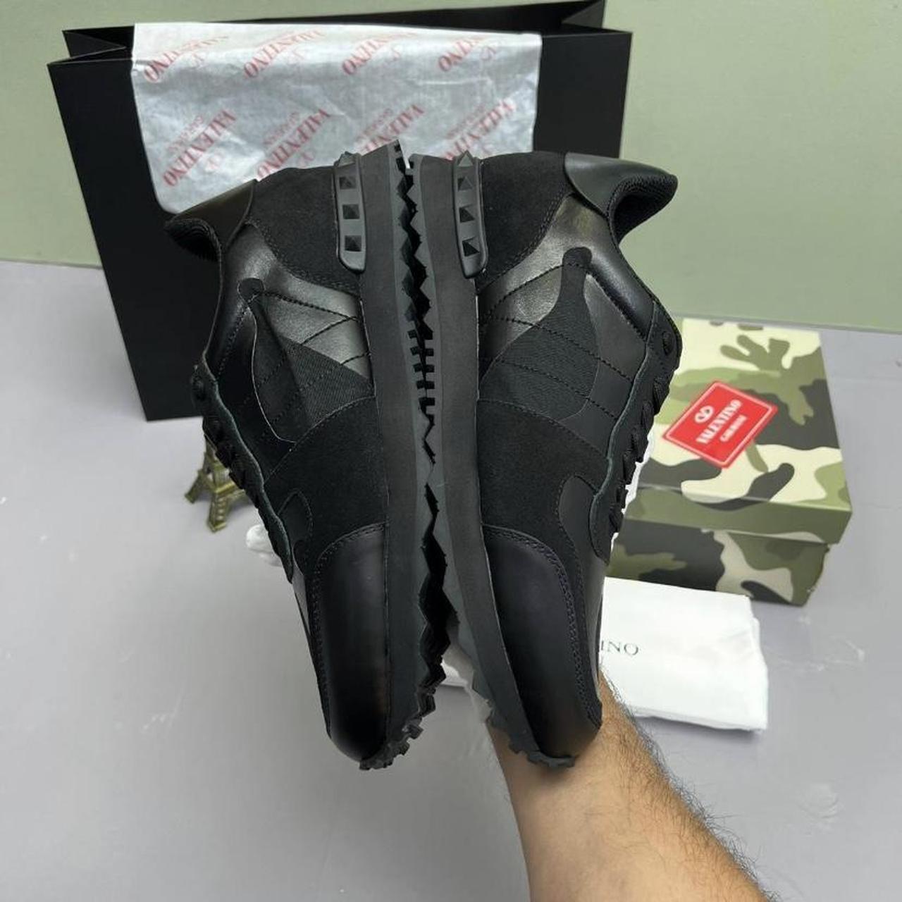 triple black valentino trainers