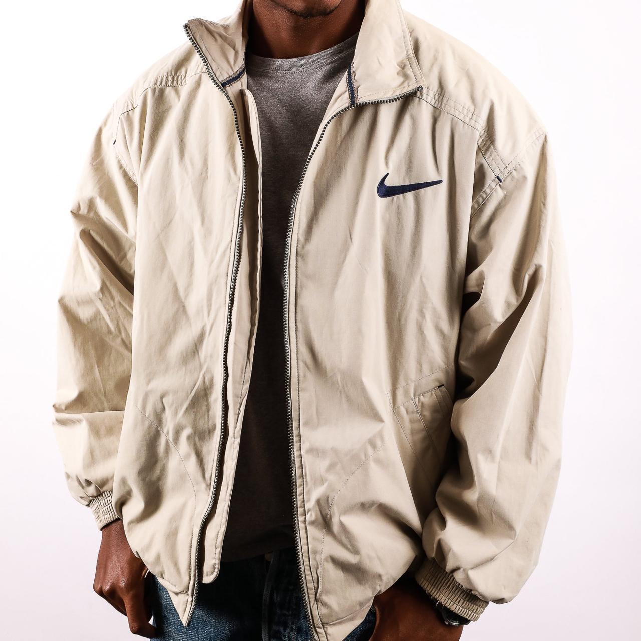 beige nike jacket