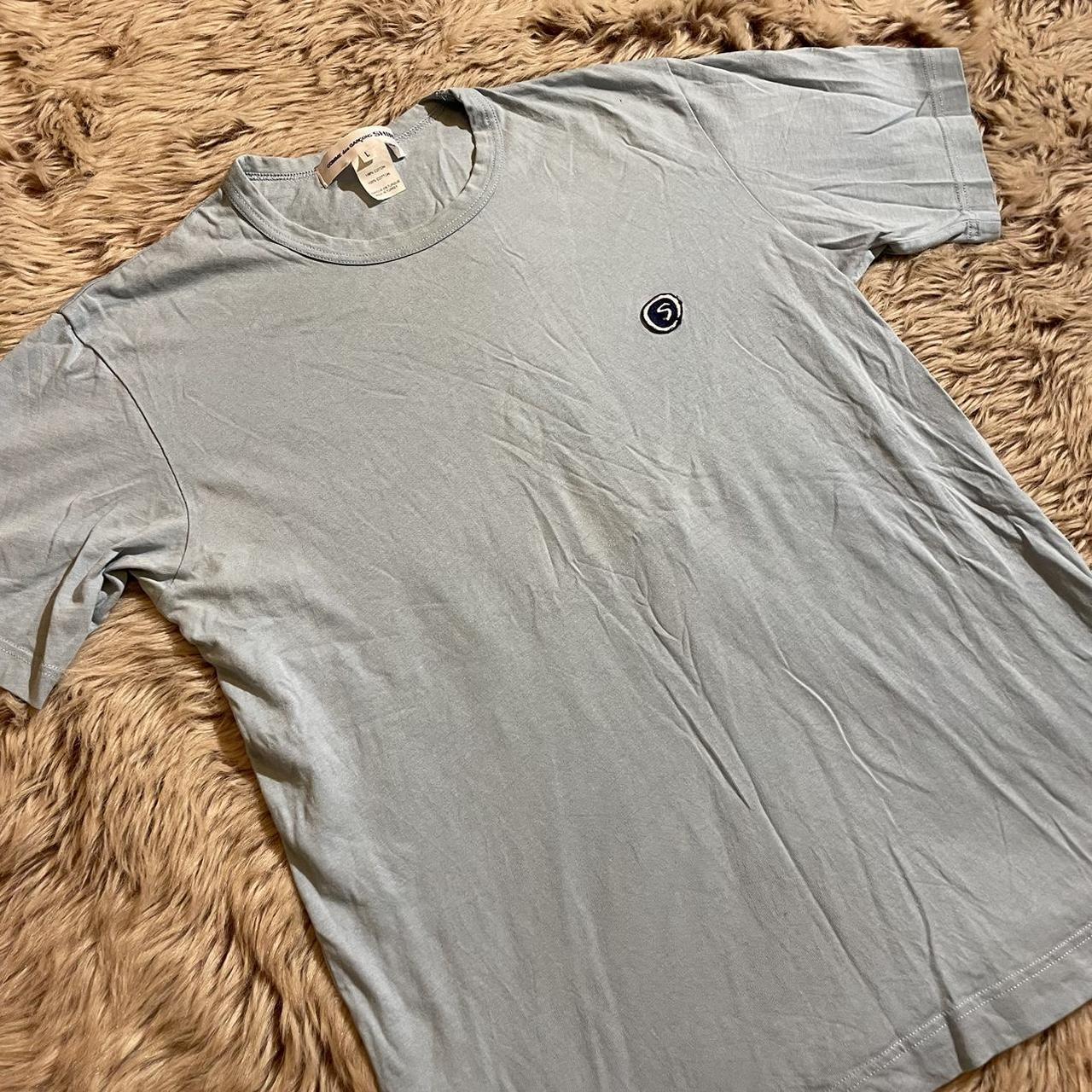 Commes de garcon pale baby blue t shirt with chest... - Depop
