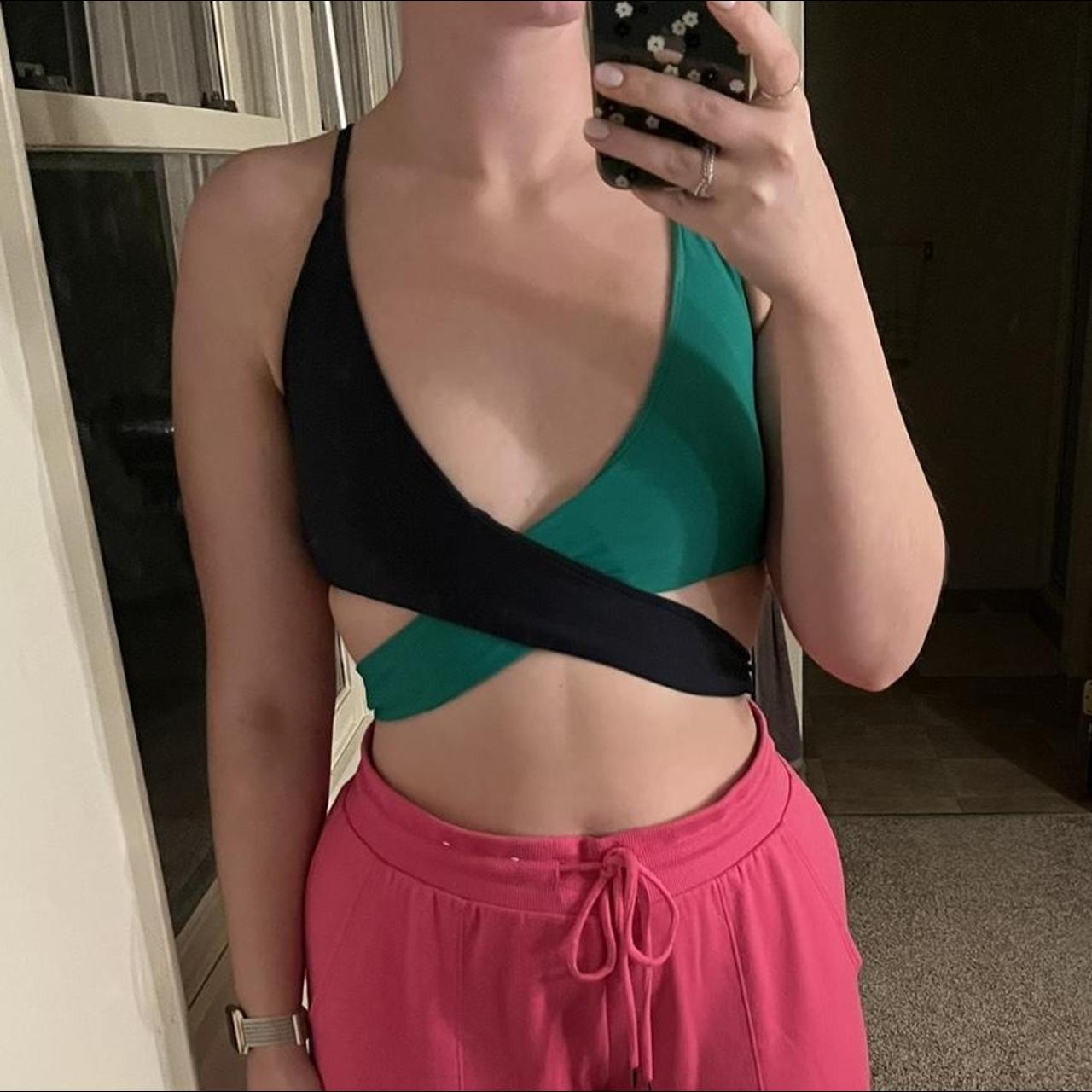 Criss cross aerie bikini top. Color is navy blue and... Depop