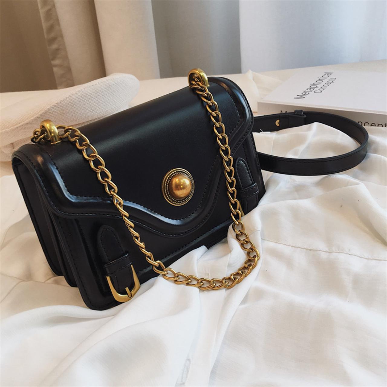 Young Versace Women's Black and Gold Bag | Depop