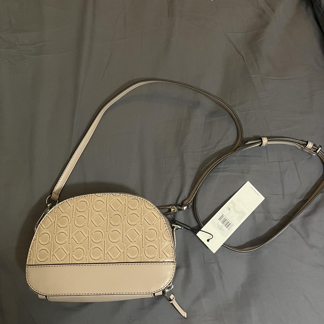 White and brown crossbody Calvin Klein bag. Has CK - Depop