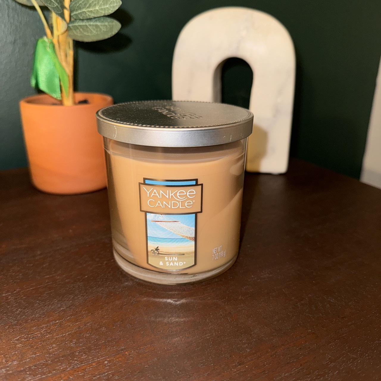 Yankee candle "sun and sand" scent!! Never been... Depop