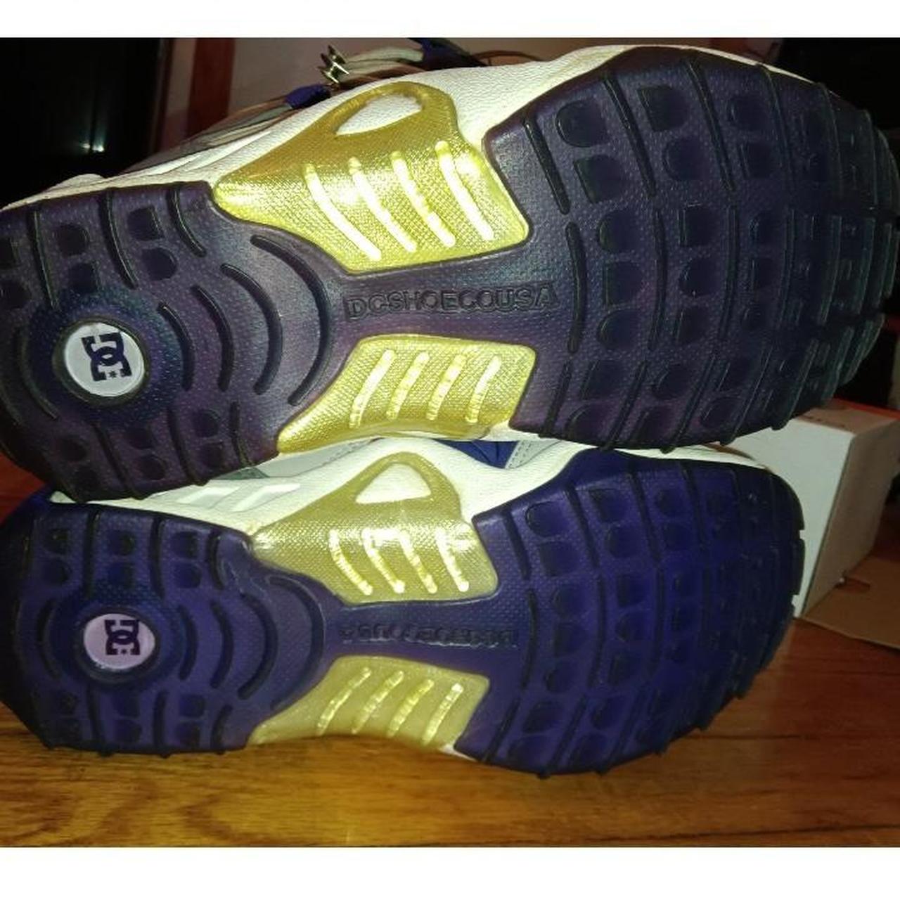 black and purple dc shoes