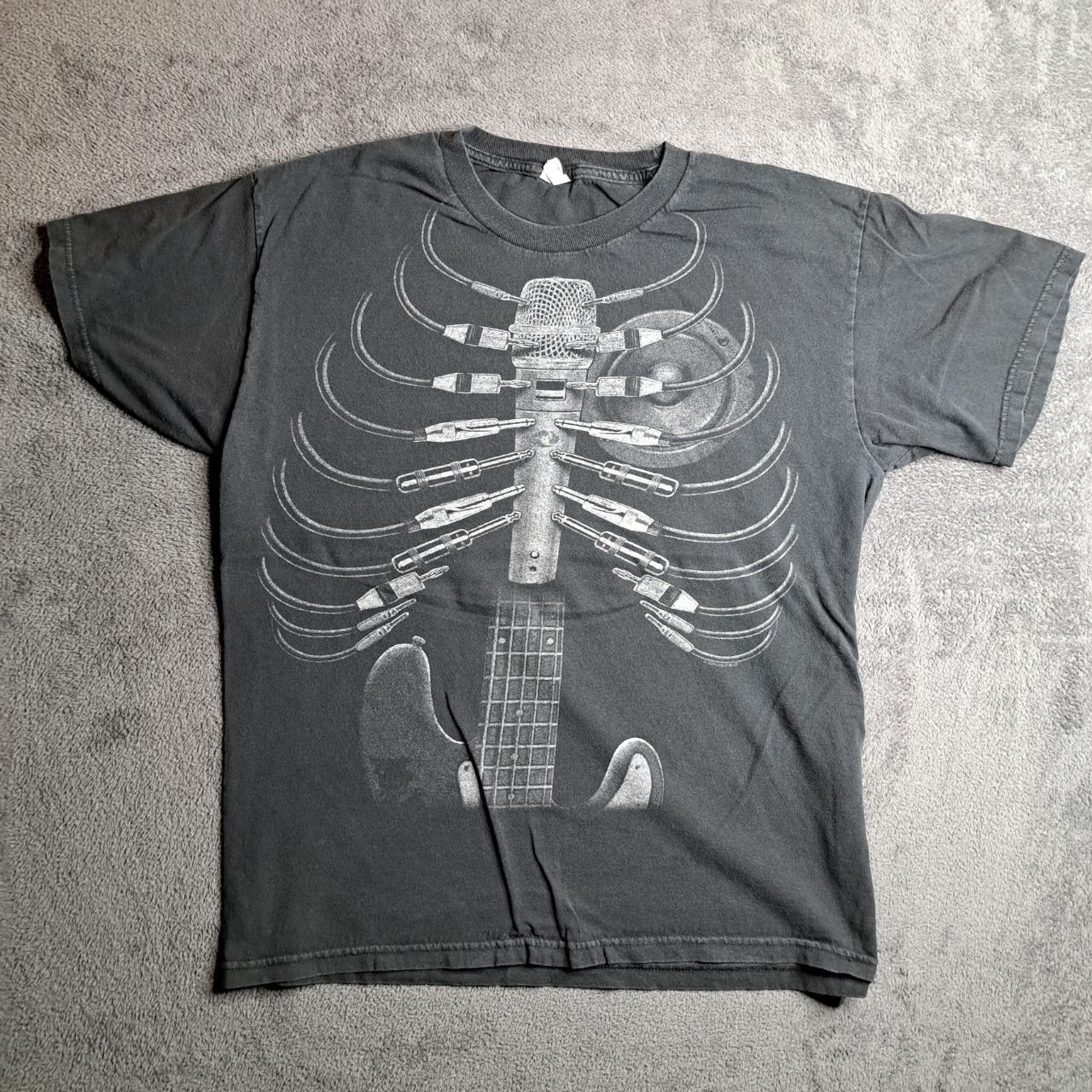 y2k punk style ribcage made of guitar mic and plugs... Depop