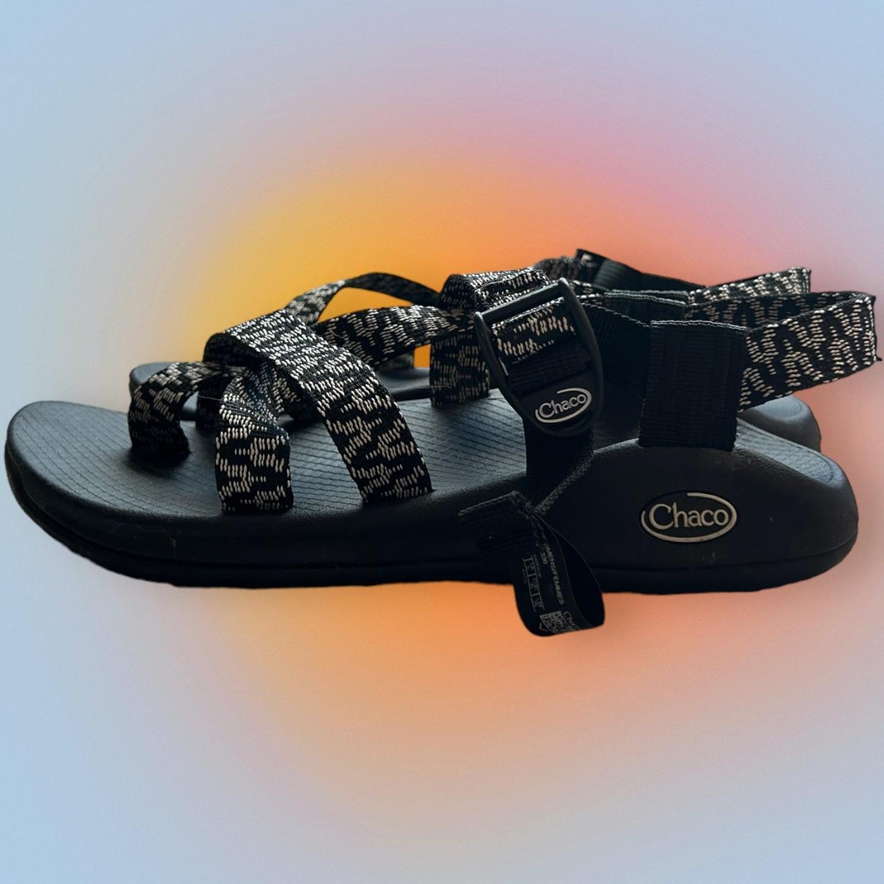 Chaco black best sale and white sandals