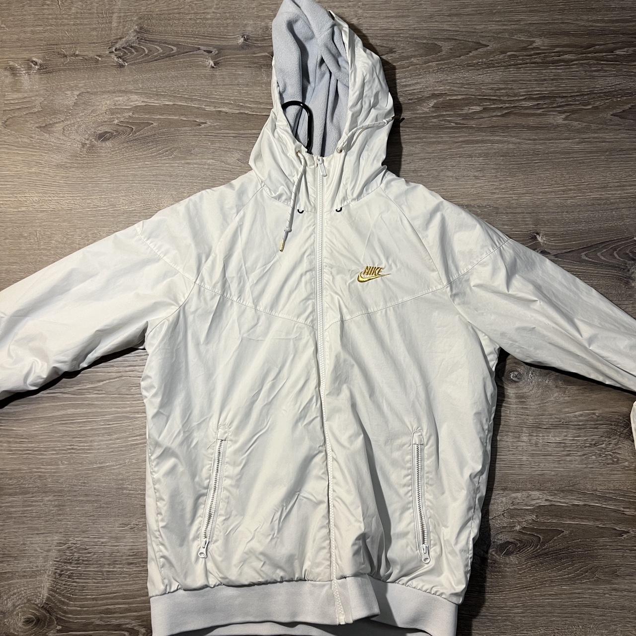 Small Nike White and gold jacket. Great for rainy. Depop