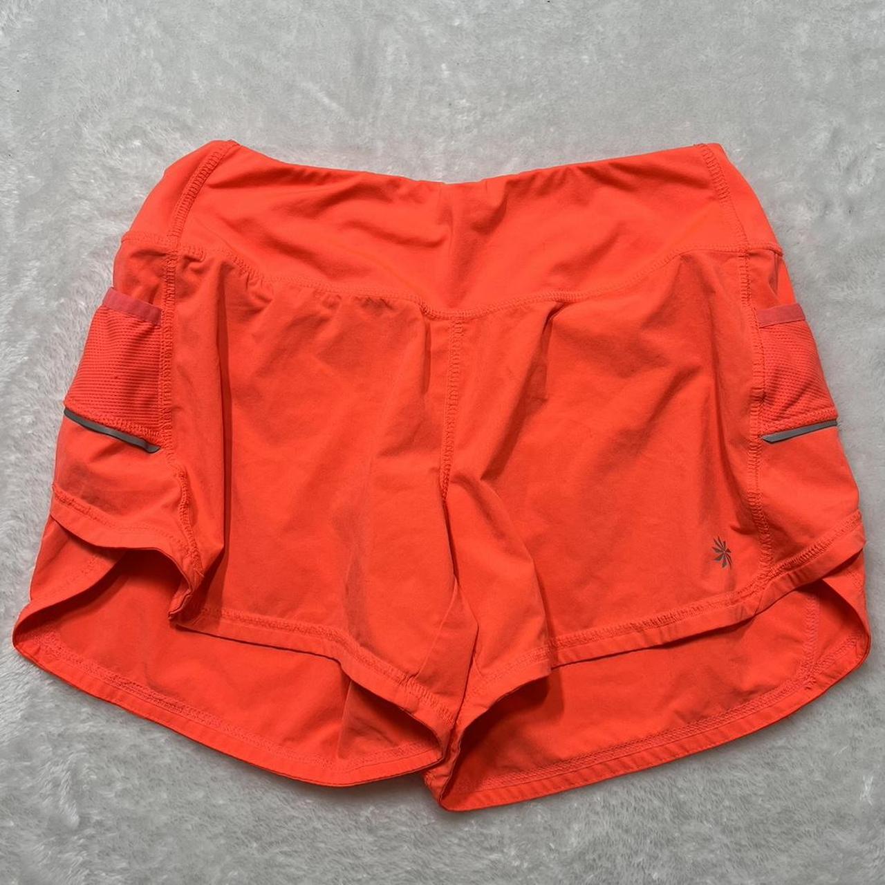 Athleta orange shorts size xs women's athletic shorts - Depop