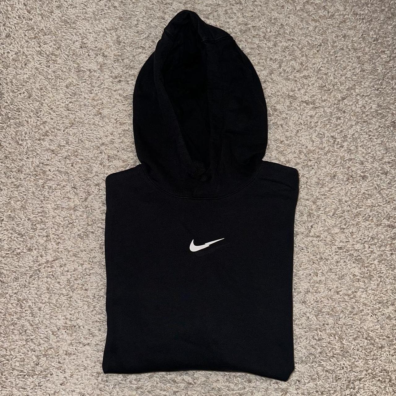 nike swoosh hoodie on tour