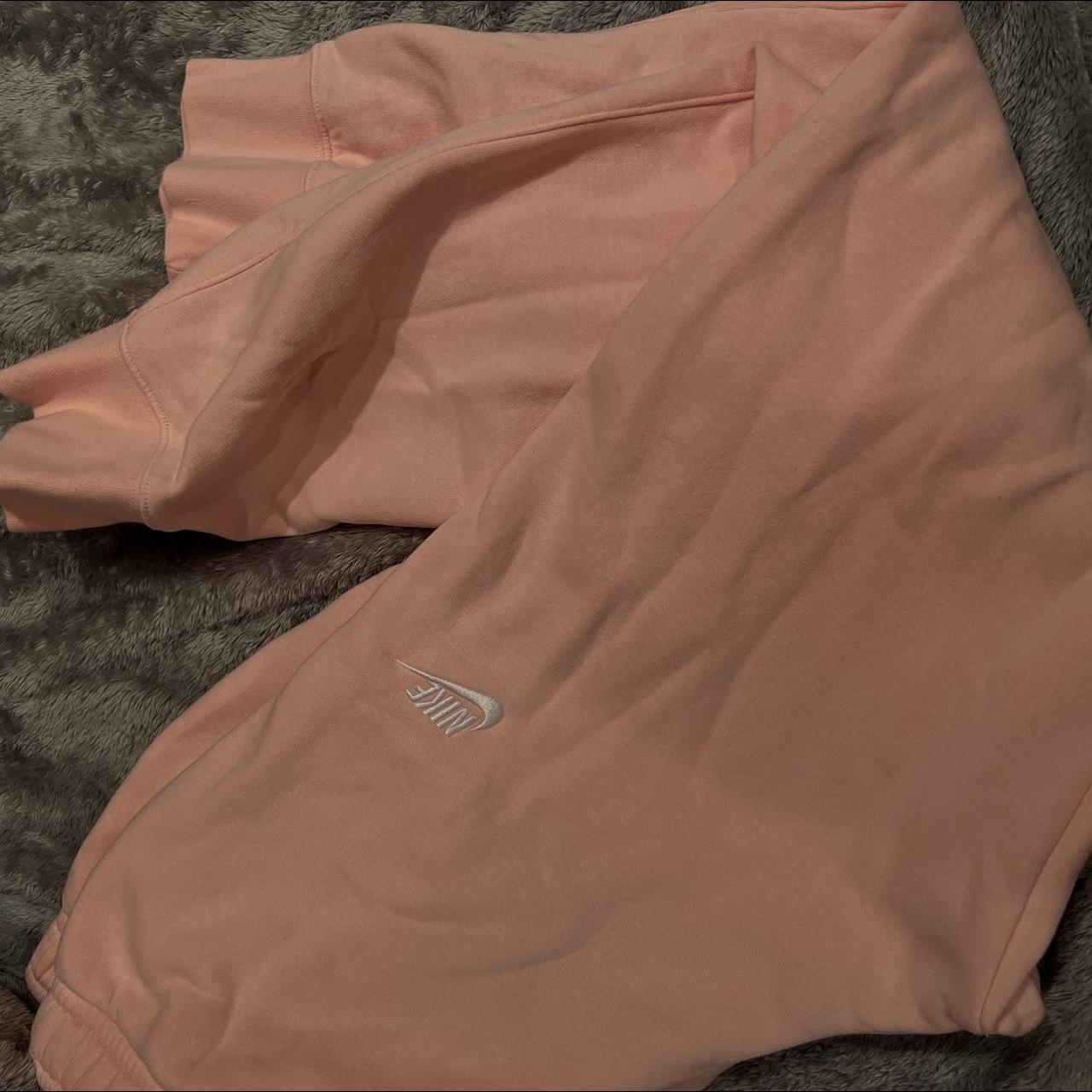 light pink nike sweatpants unisex size large no... Depop