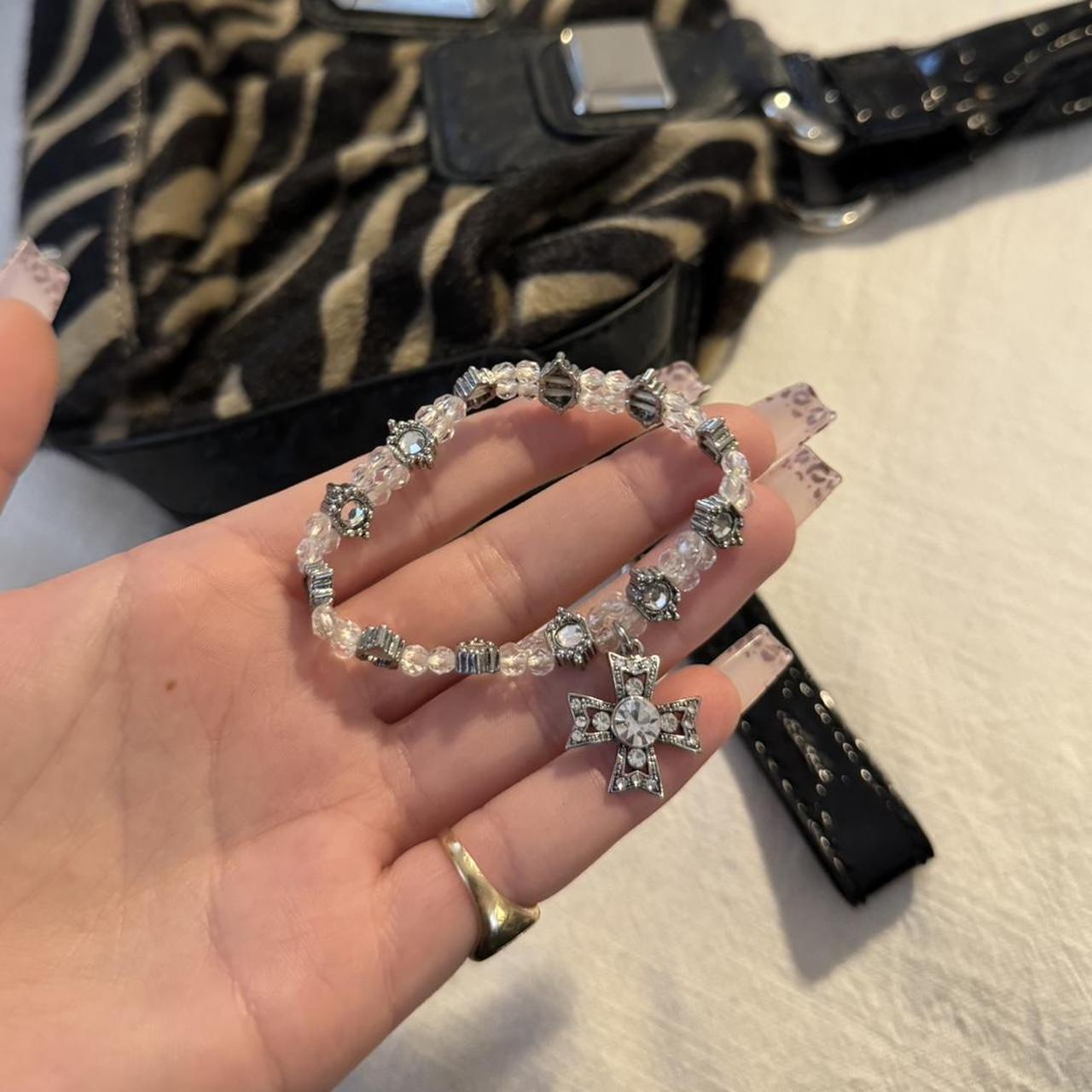 vintage stretchy cross bracelet perfect for... Depop