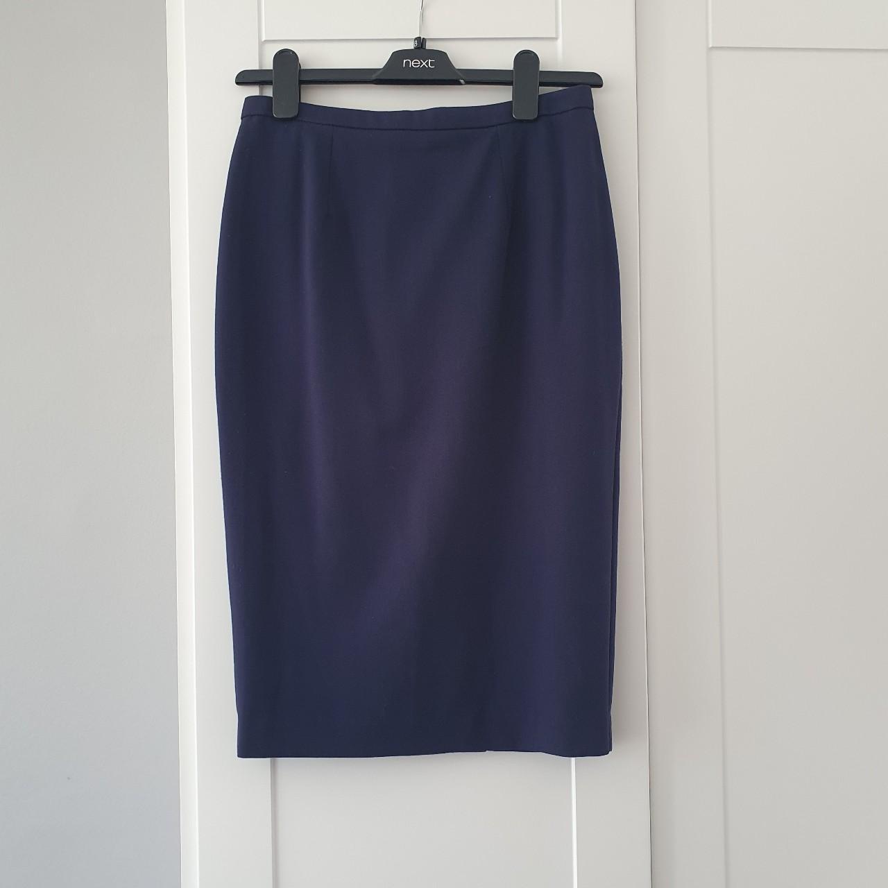 Navy blue pencil suit skirt. Size 8. Lands around... - Depop