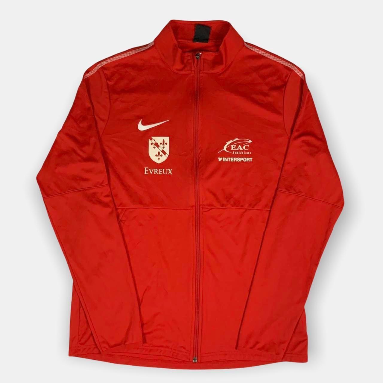 Nike red track top best sale