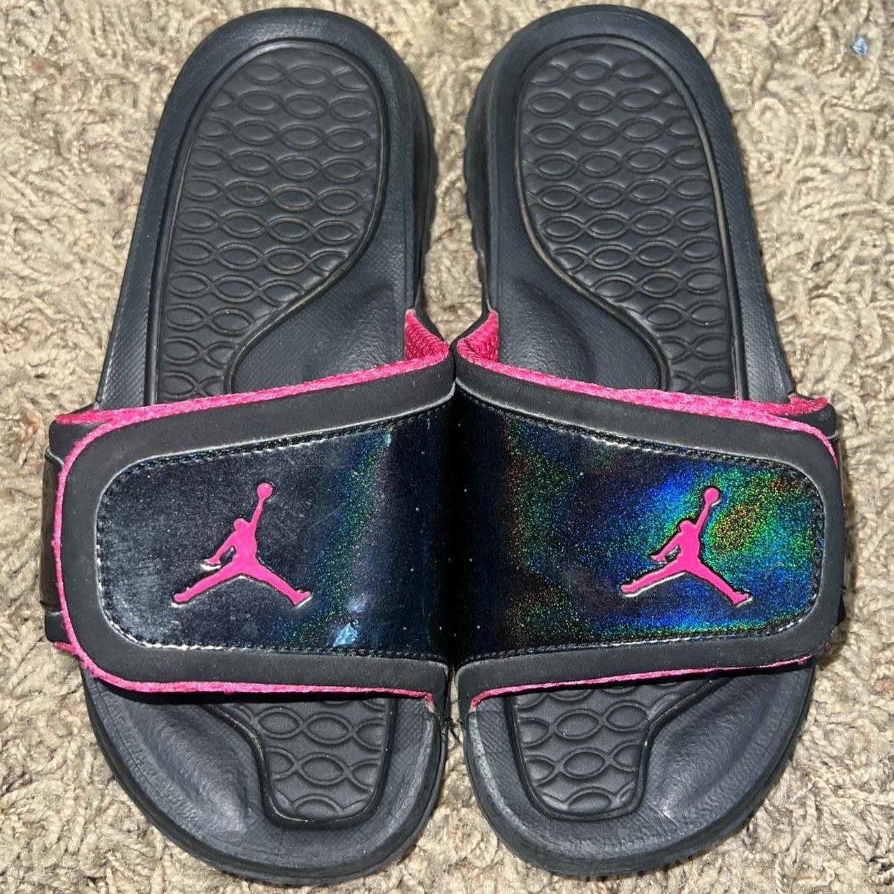 Pink and black jordan slides on sale