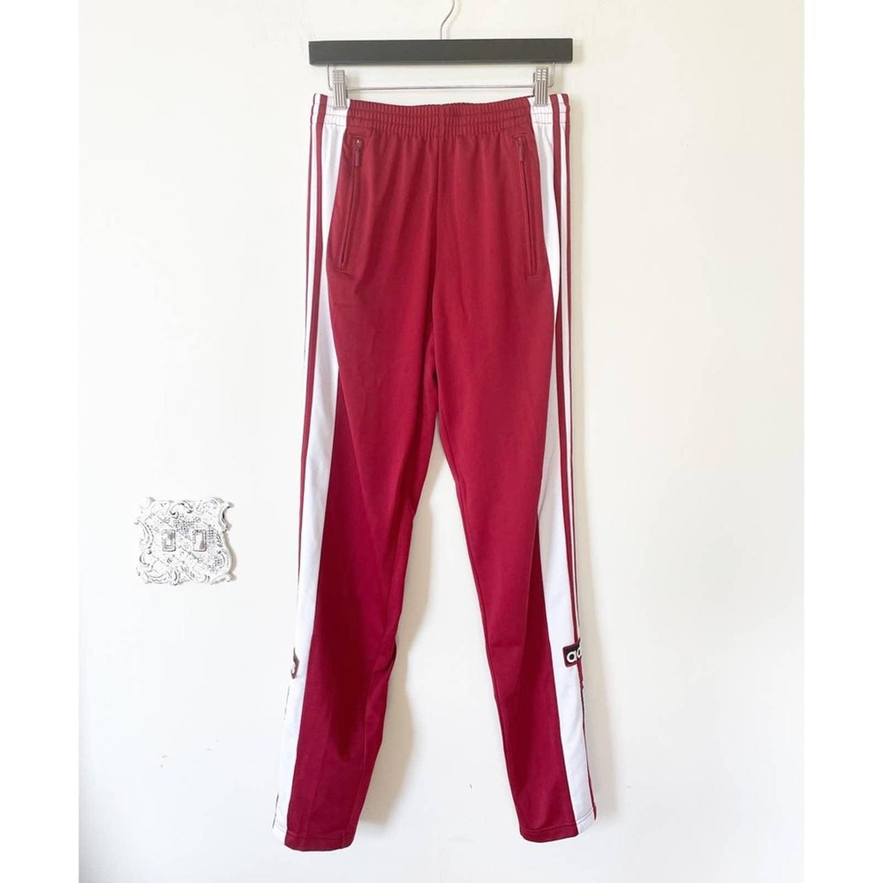 adidas Originals three stripe joggers in red