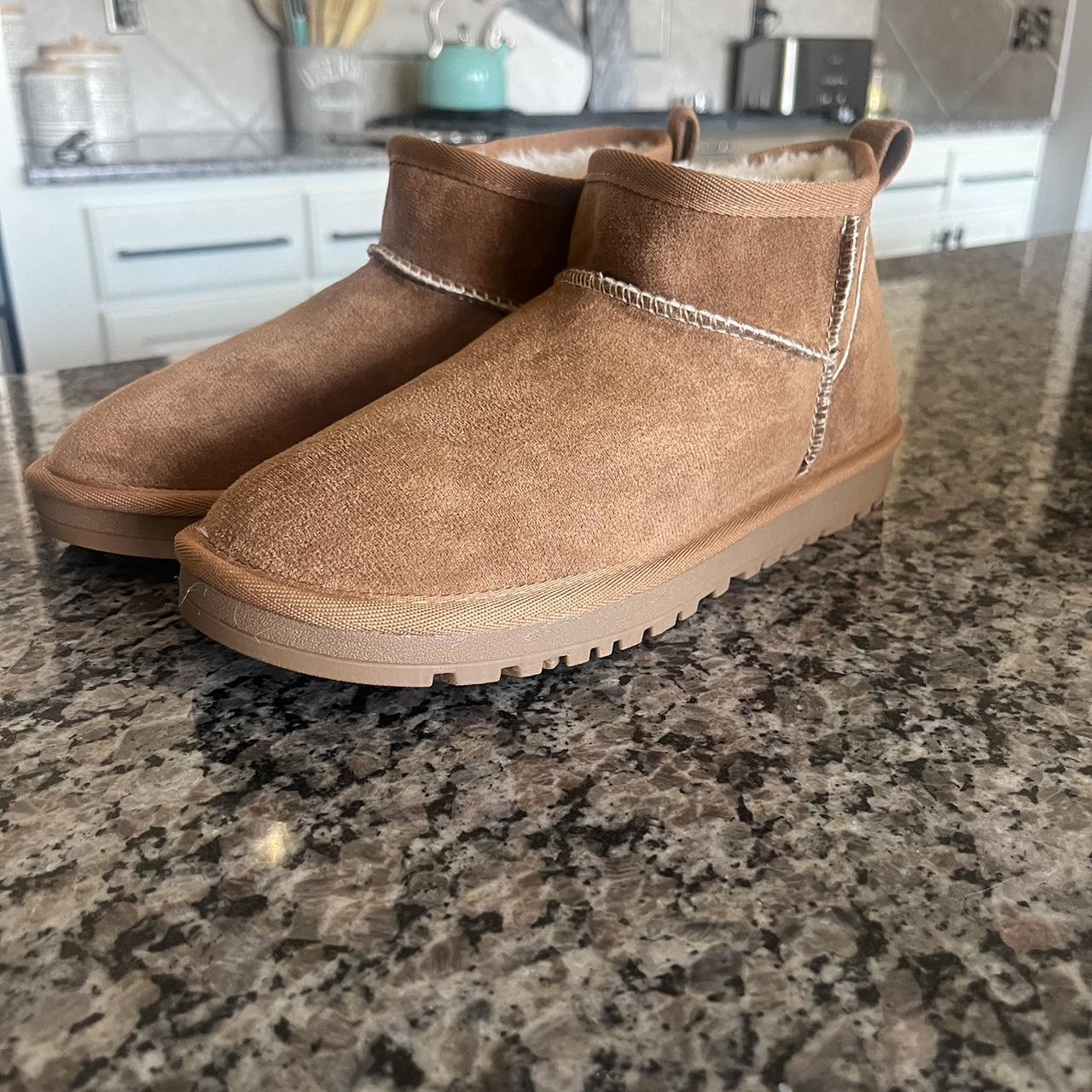 -Knock off uggs - never worn - size 8 - look very... - Depop