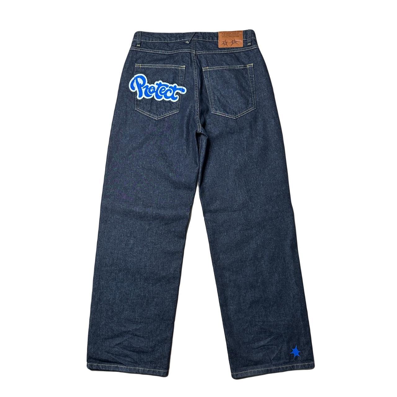 Protect Blue Spike Baggy Jeans Size: Medium... - Depop