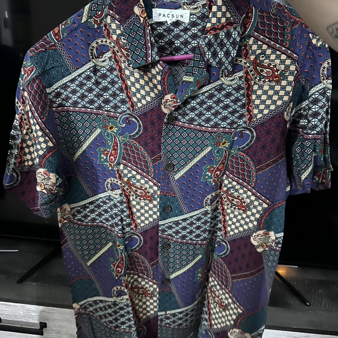 Camp shirt with paisley pattern. Size small. Always...