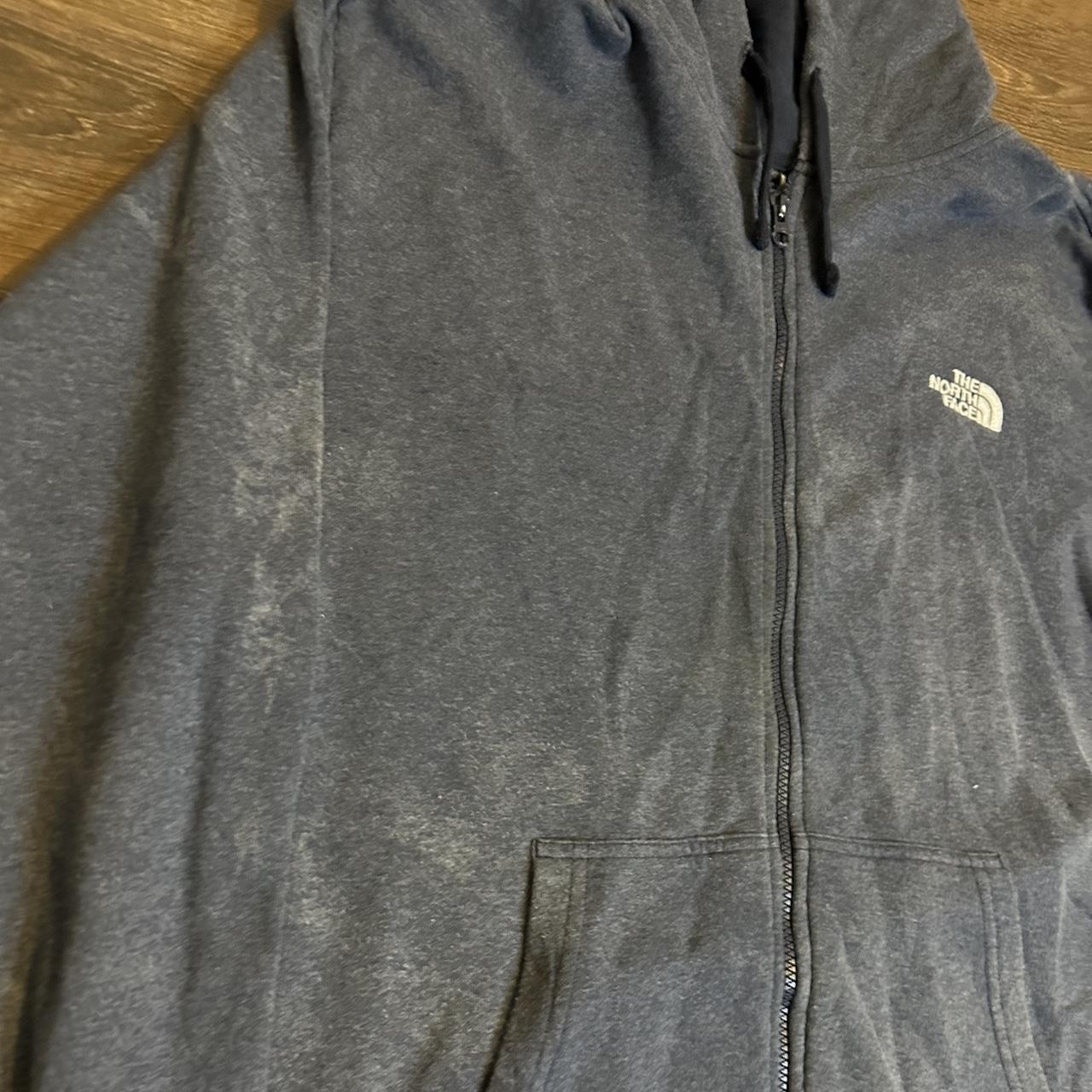 Amazing blue north face zip up hoodie has white... - Depop