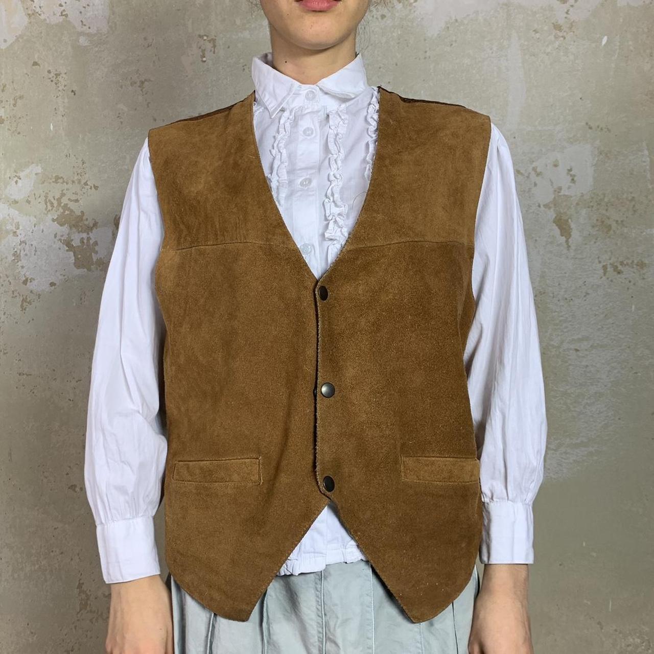 Brown leather vest with silky back. Pockets and V... Depop