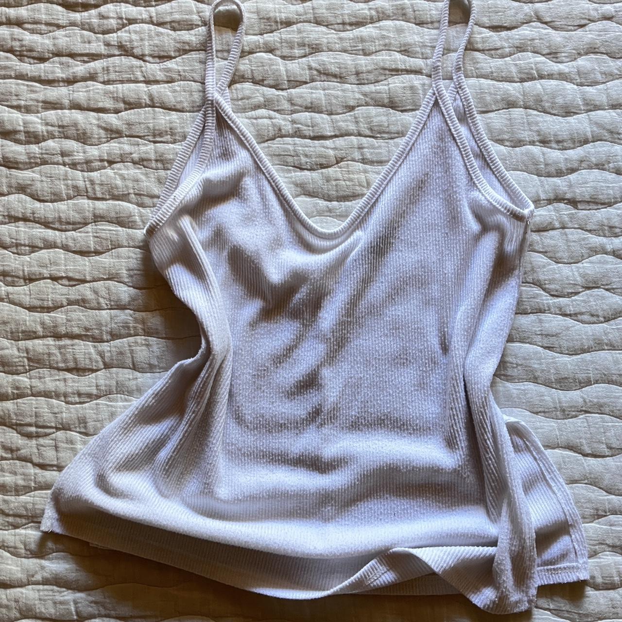 Brandy Melville White Tank With Split Opening On The... - Depop