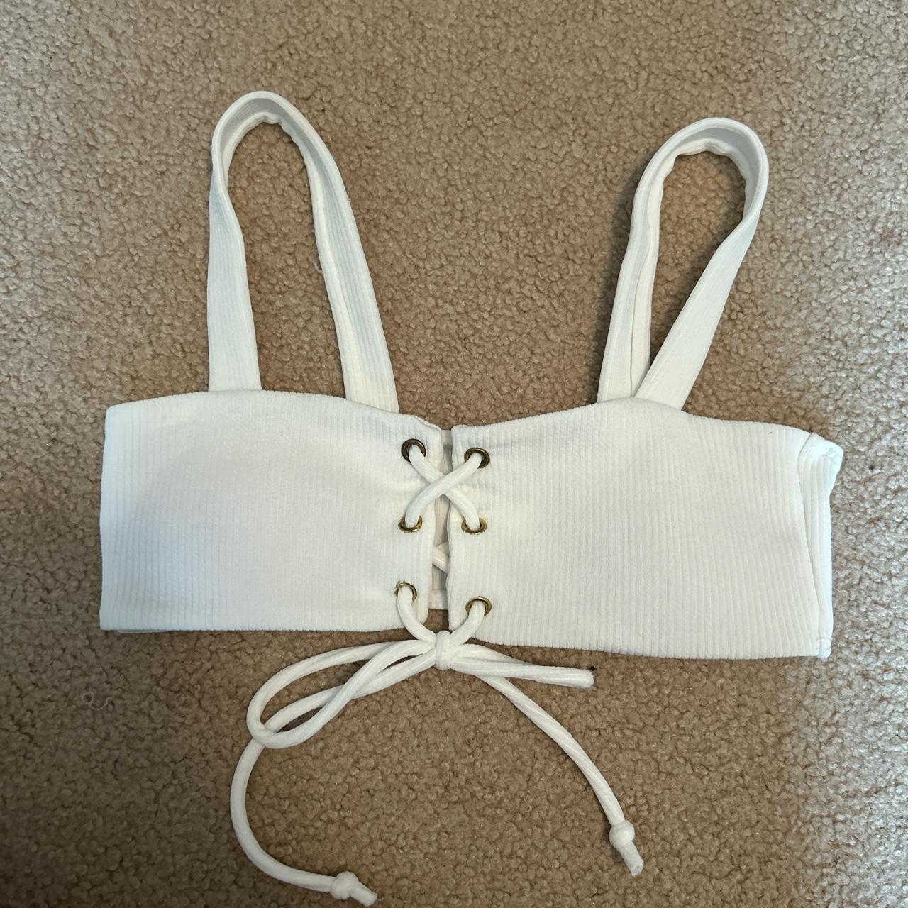 super cute white bikini top! doesn’t fit my boobs... Depop