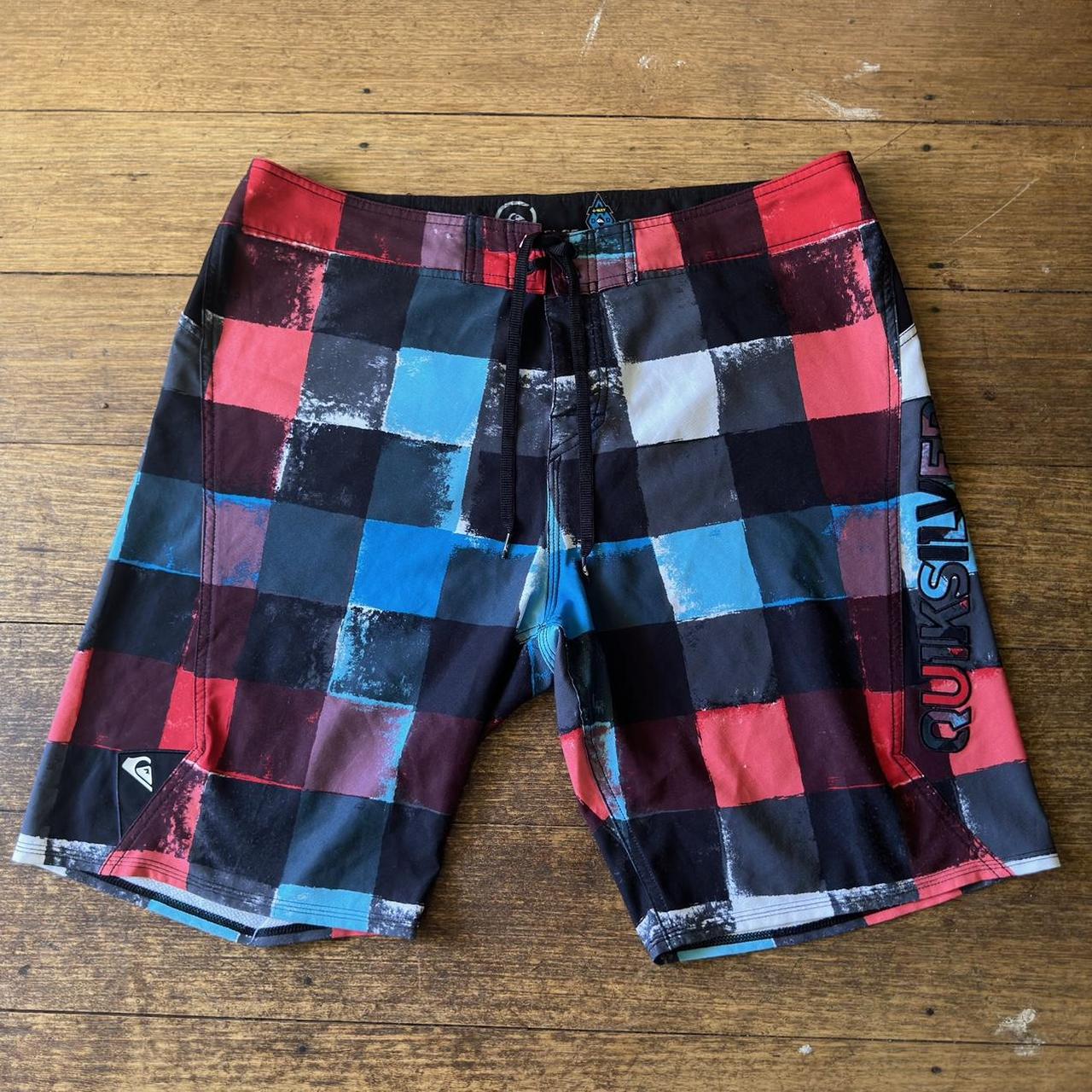 red, blue, black and white checkered quiksilver... - Depop